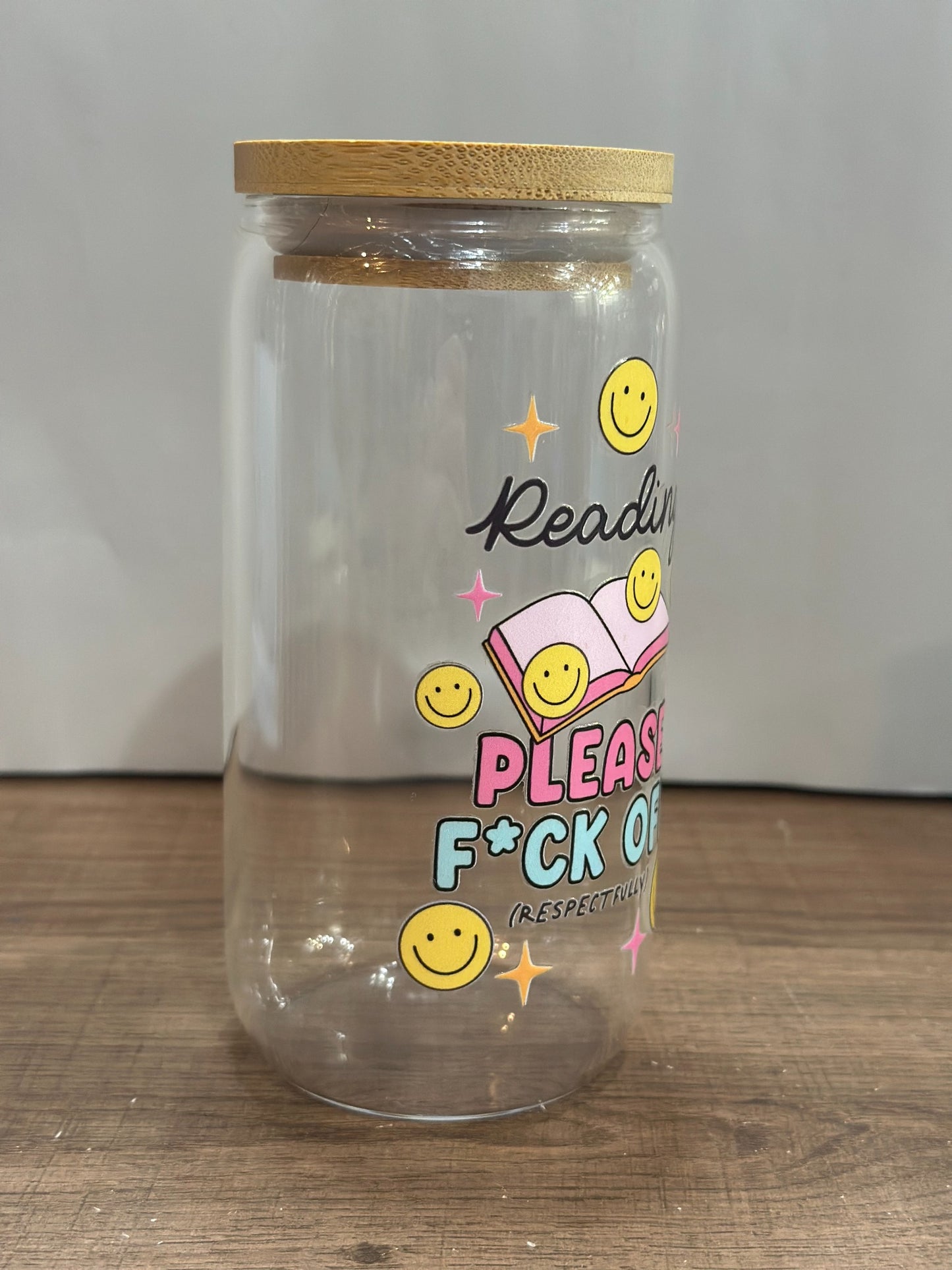 Reading Please F*ck Off – 16oz UV DTF Libby Glass with Bamboo Lid, Straw & Smiley Daisy Charm